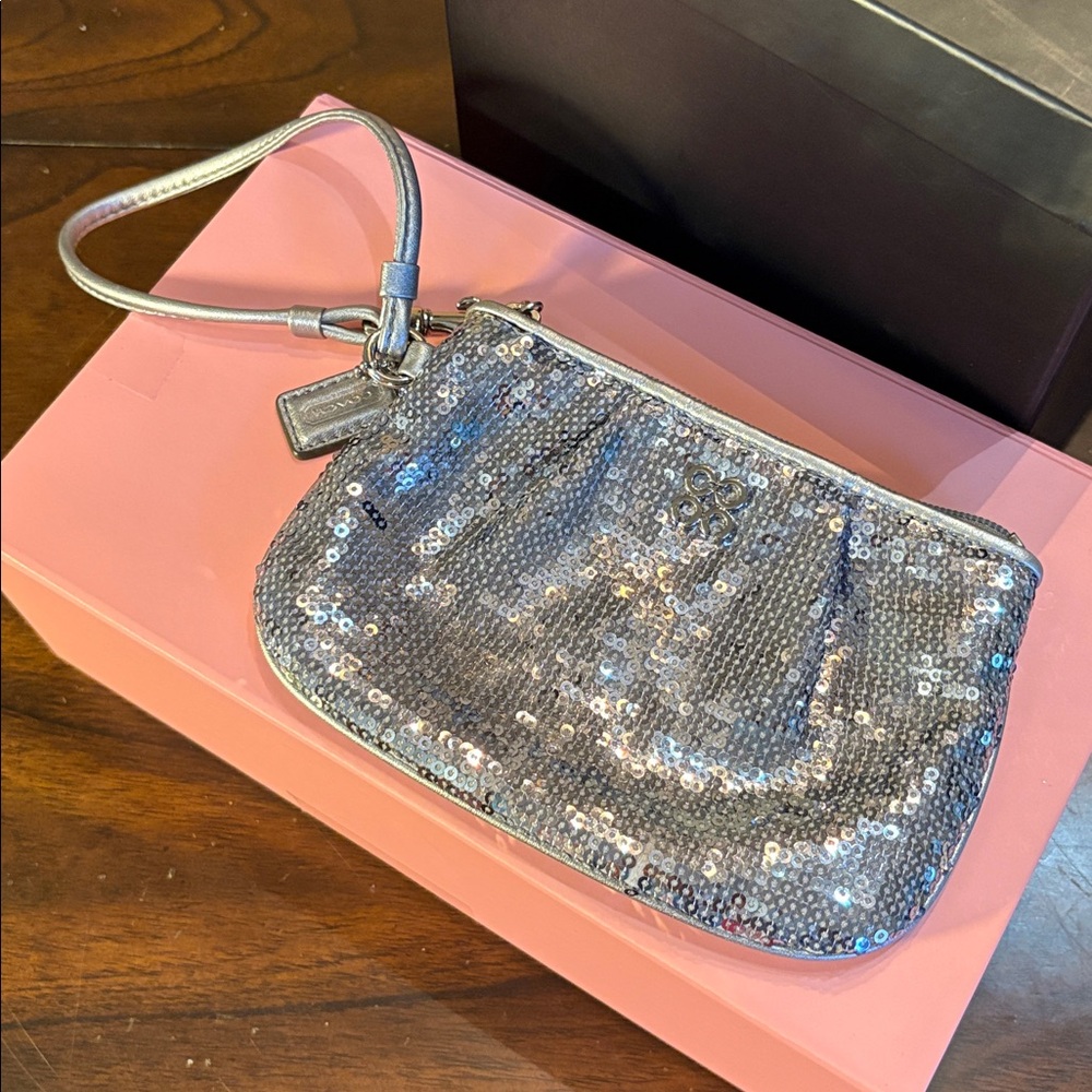 Coach Silver Sequin Zipper top Wristlet / wallet with hang logo tag